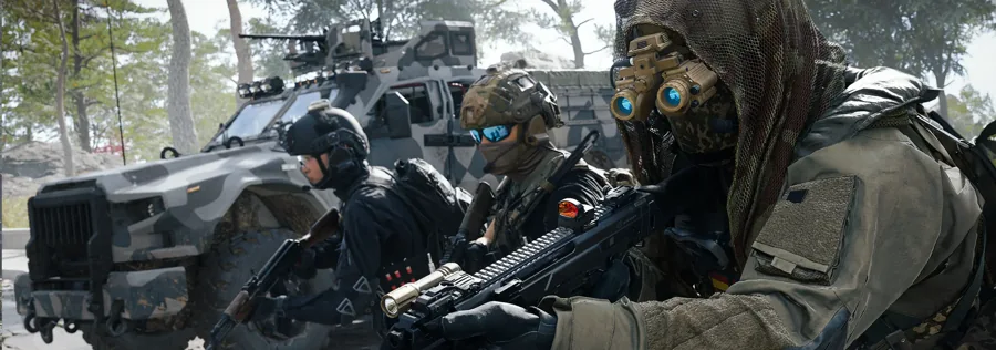 An armed squad beside a vehicle in woodland, from the official MW4 DMZ Hajin overview.